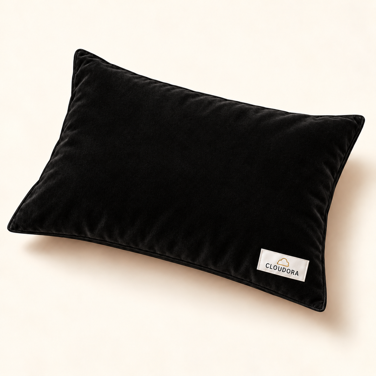 Cloudora black velvet pillow — AI-assisted product visual